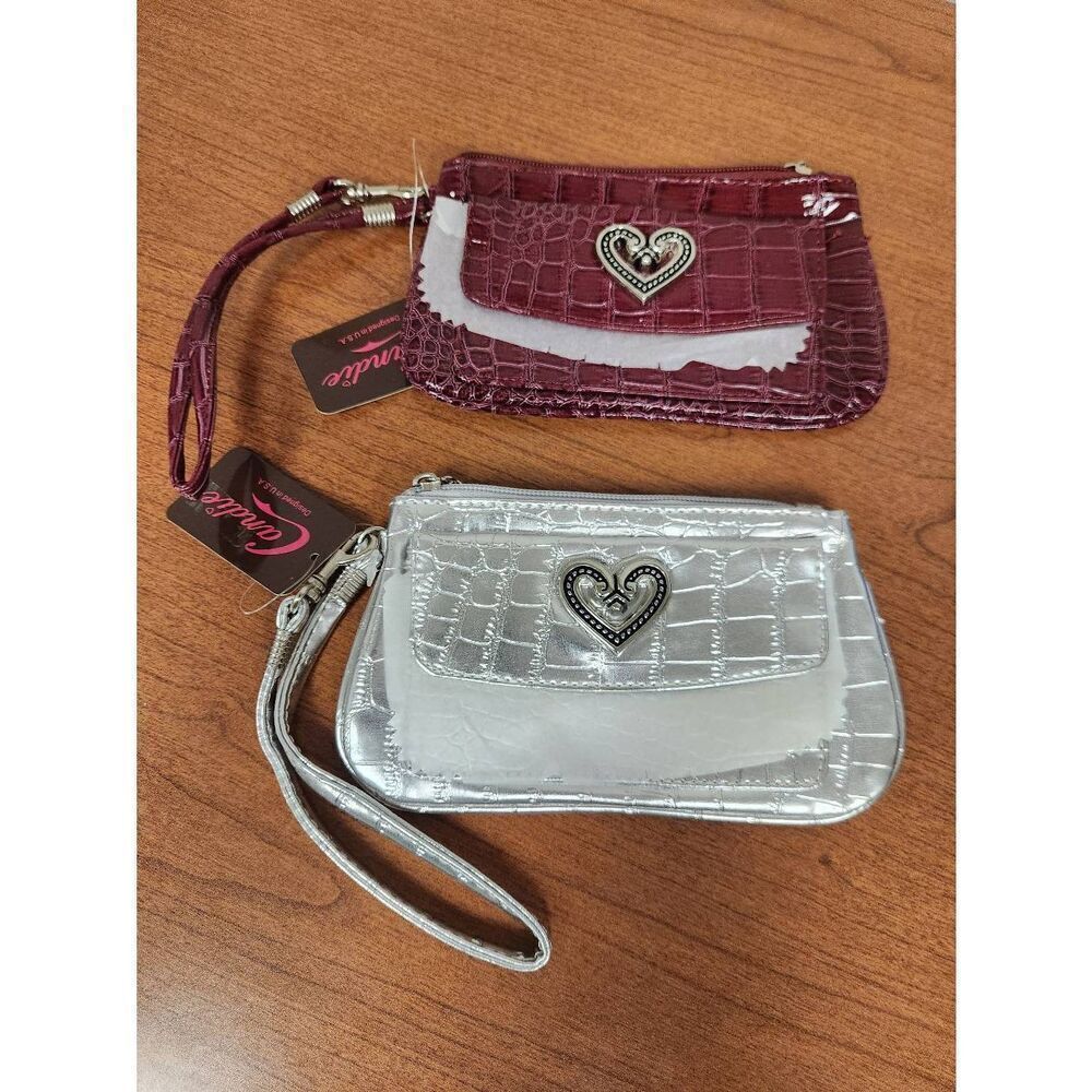 NWT SET OF 2 Candie's Wristlet. One silver, one maroon